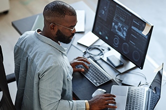 Man working at a computer station