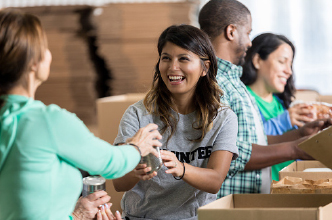 A volunteer interacting with people